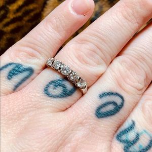 1ct, 5 Diamond tension set wedding band